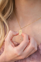 Bow Pendant Necklace in Gold