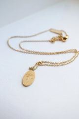 Bow Pendant Necklace in Gold